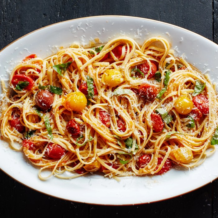 Creamy pasta bake with cherry tomatoes and basil