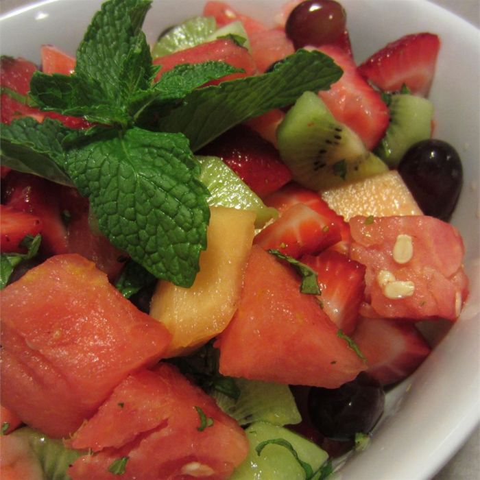 Summer fruit salad with a lemon honey and mint dressing