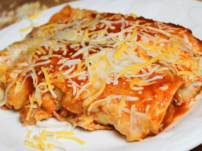 Refried bean and cheese enchiladas