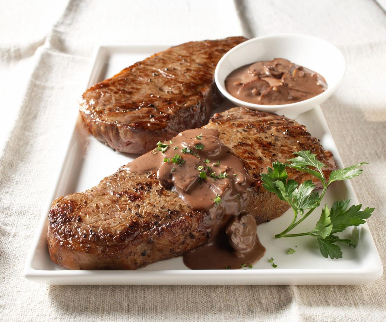 Strip steak with red wine cream sauce