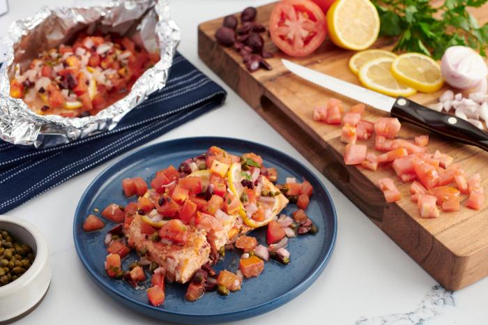 Grilled mediterranean salmon in foil