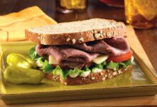 Dripping roast beef sandwiches with melted provolone