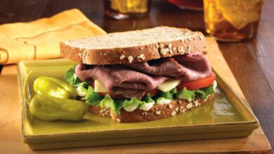 Dripping roast beef sandwiches with melted provolone