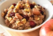 Slow cooker overnight oatmeal with apples cranberries and walnuts