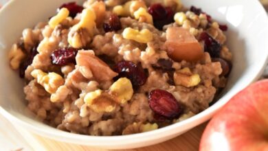 Slow cooker overnight oatmeal with apples cranberries and walnuts