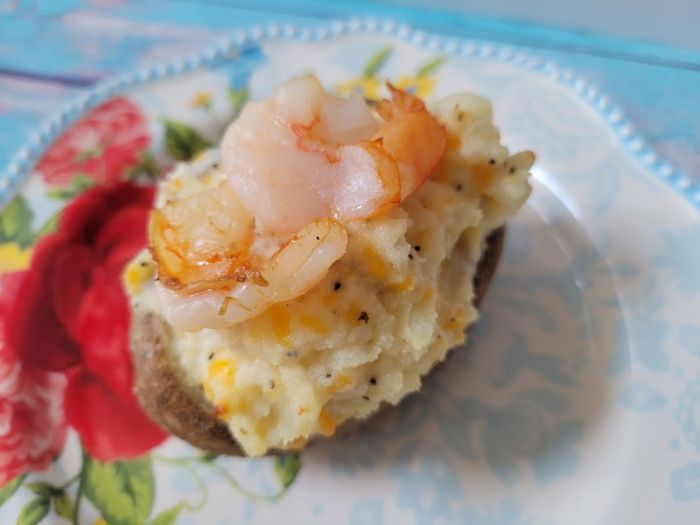 Cheesy shrimp stuffed twice baked potatoes