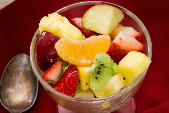 Summer fruit salad with a lemon honey and mint dressing