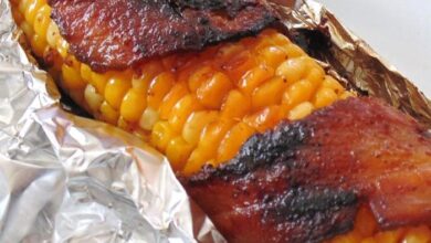 Grilled bacon wrapped corn on the cob