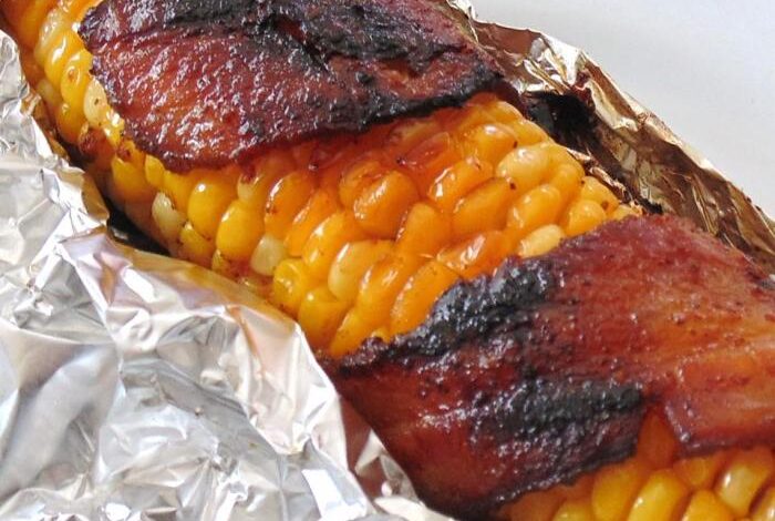 Grilled bacon wrapped corn on the cob