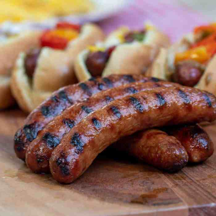 Grilled sausages with caramelized onions and apples