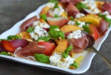 Grilled prosciutto wrapped peaches with burrata and basil