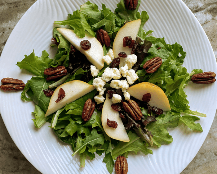 Blue cheese and dried cranberry tossed salad