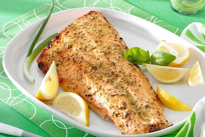 Grilled salmon with creamy pesto sauce