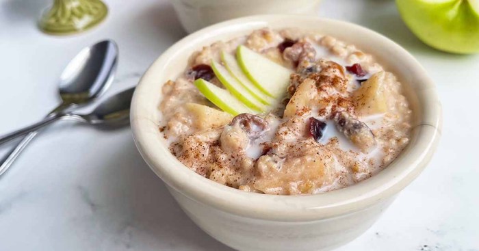 Slow cooker overnight oatmeal with apples cranberries and walnuts