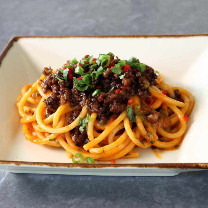 Spicy pumpkin pork noodles