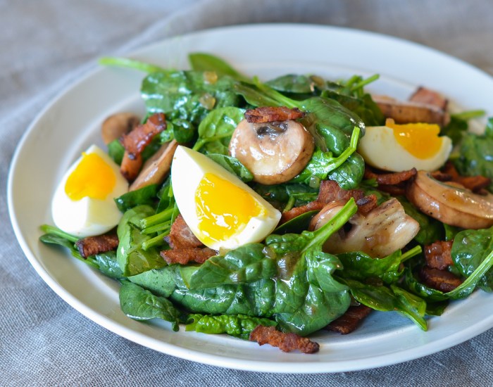 Spinach salad with warm bacon mustard dressing