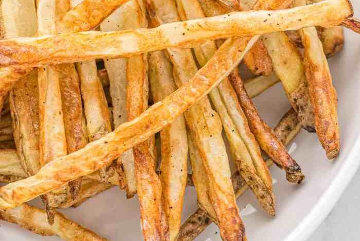 Air fried purple yam fries with sour cream sriracha sauce