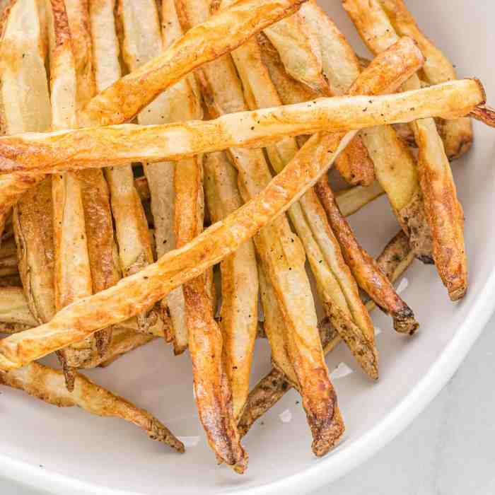 Air fried purple yam fries with sour cream sriracha sauce
