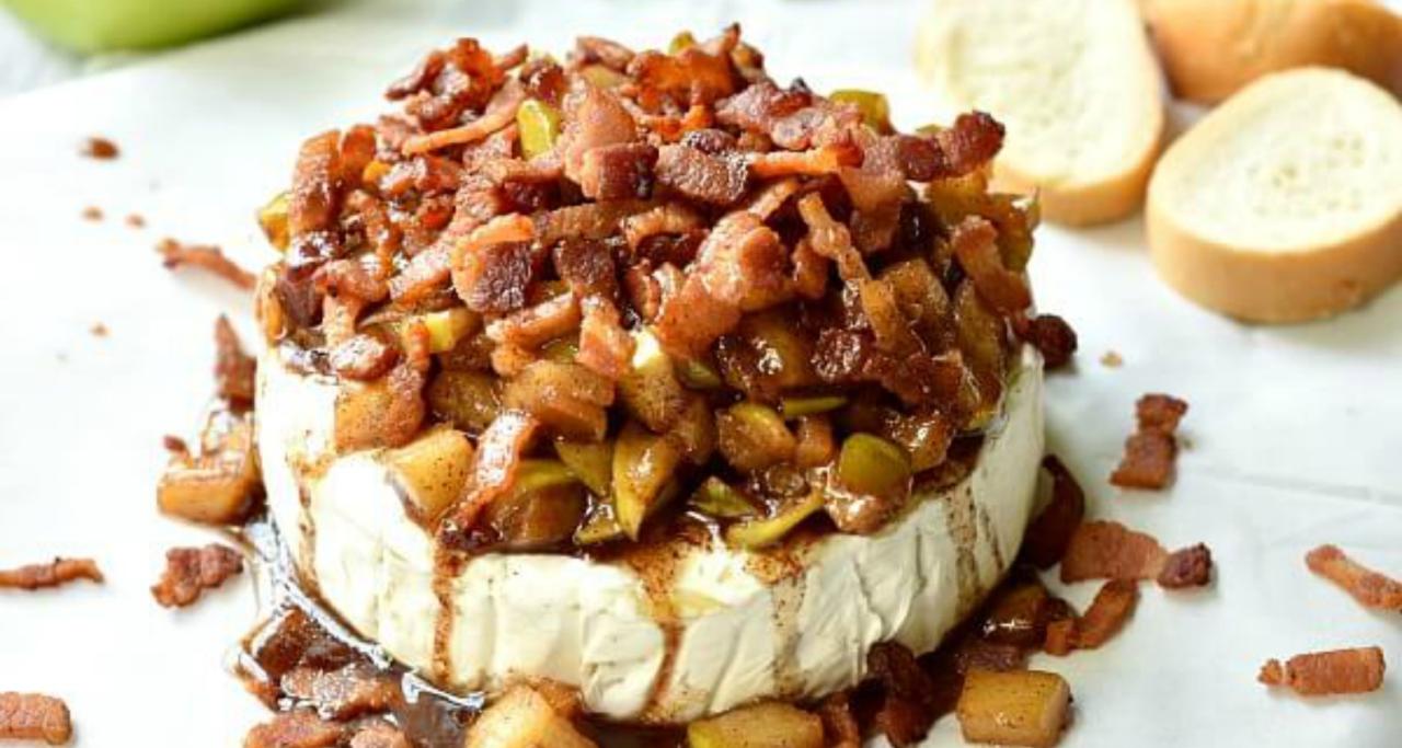 Baked brie with maple caramelized apples and spiced praline bacon