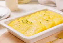 Baked polenta with fresh tomatoes and parmesan