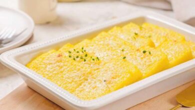 Baked polenta with fresh tomatoes and parmesan