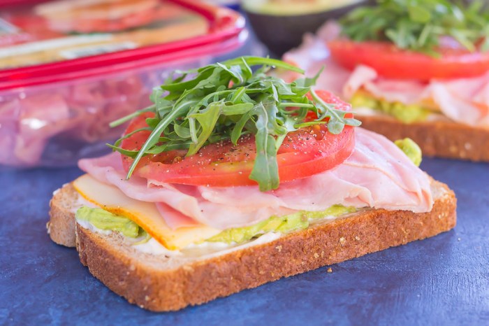 Broiled spam and cheese open face sandwiches