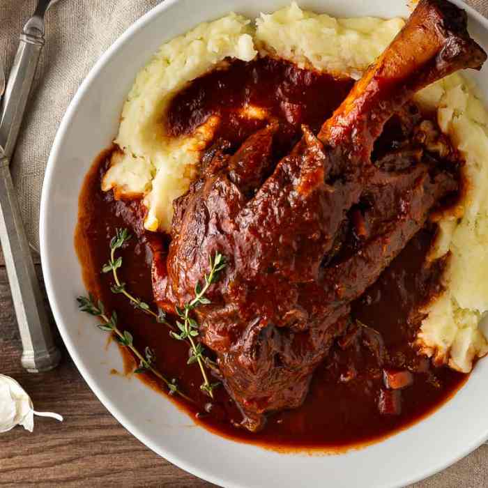 Lamb shank braised in white wine with rosemary