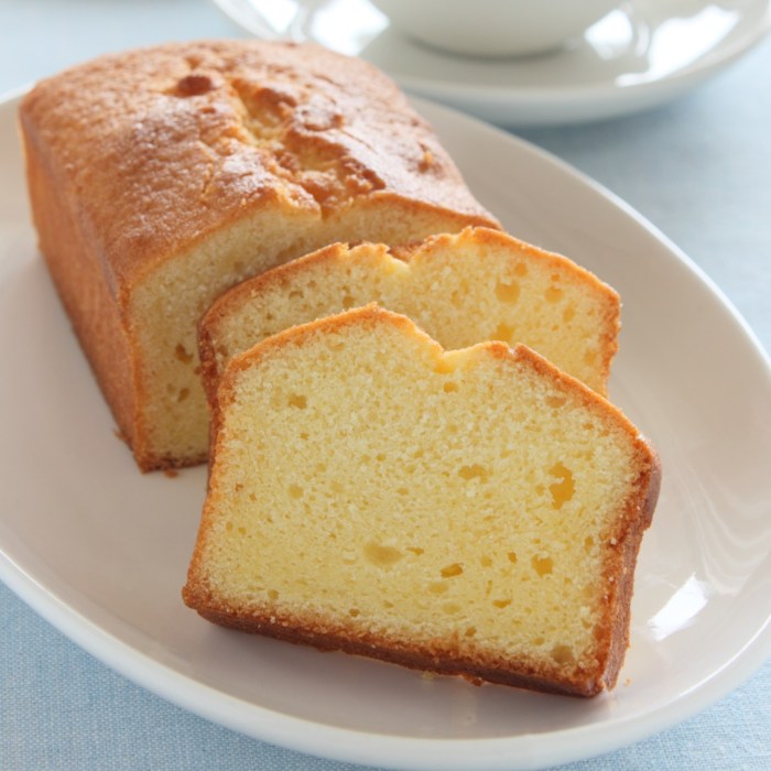 Old fashioned pound cake with raspberry sauce