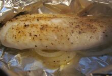 Grilled herbed tilapia in foil packets