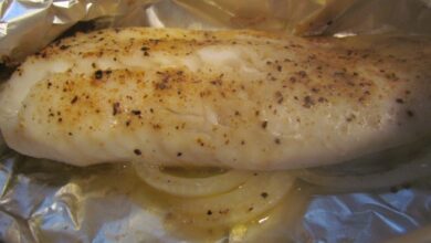 Grilled herbed tilapia in foil packets