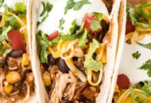 Fiesta slow cooker shredded chicken tacos