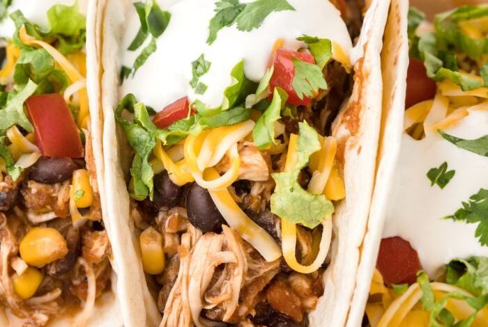 Fiesta slow cooker shredded chicken tacos