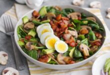 Spinach salad with warm bacon mustard dressing