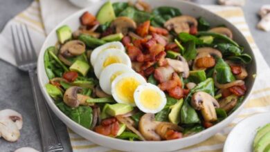 Spinach salad with warm bacon mustard dressing