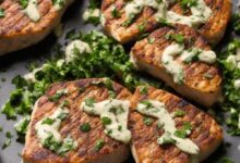 Tuna steaks with garlic herb cream sauce