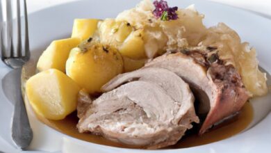 Slow cooker german style pork roast with sauerkraut and potatoes
