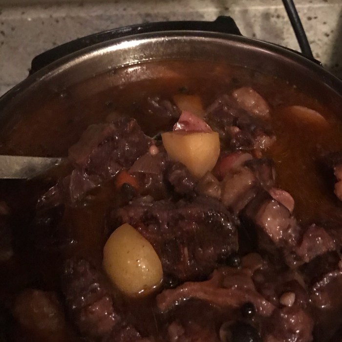 Braised oxtails in red wine sauce