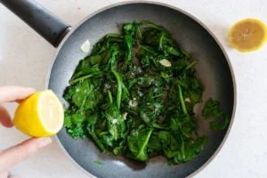 The Enduring Simplicity and Healthful Power of Cretan Horta: A Spotlight on Sautéed Spinach with Lemon